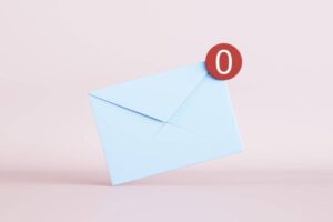 A pastel blue envelope with a red circular notification showing 0 on a soft pink background, symbolizing no new messages.
