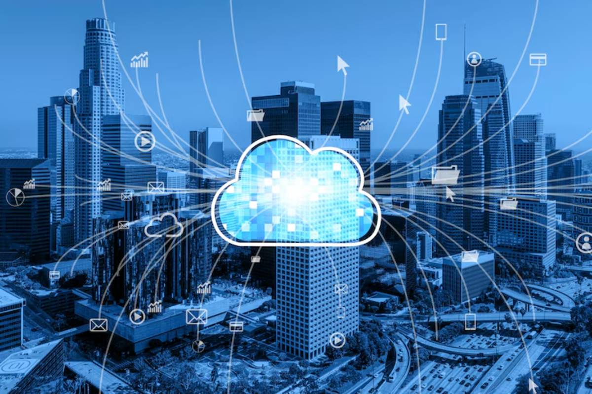 A digital cloud icon amidst a city skyline, with various technology symbols indicating data flow and connectivity.